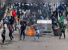 Protesters being transported in a police van during unrest in Bangladesh