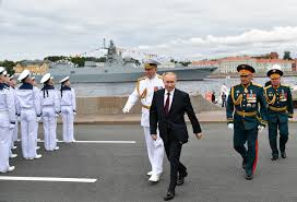 Russian President Vladimir Putin addressing a naval parade in Saint Petersburg.