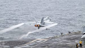 US Navy warships and fighter jets deployed to the Middle East to support Israel amid threats from Iran, Hamas, and Hezbollah.