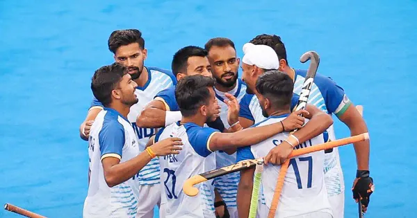 Indian men's hockey team celebrating their victory in the Paris Olympics over Great Britain penalty shoot-out.