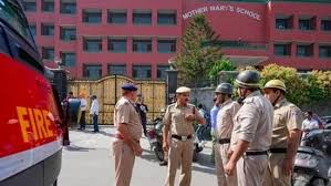 Police and bomb disposal squad at Summer Fields School in Delhi after a bomb threat