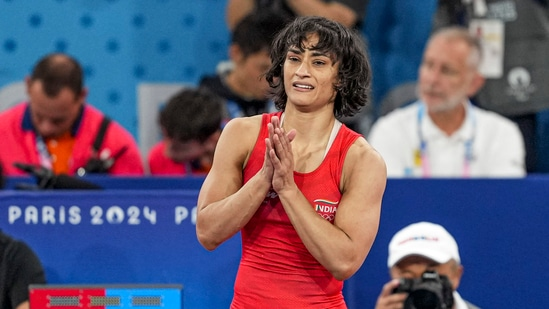 Vinesh Phogat celebrates her gold medal win at the Paris Olympics.