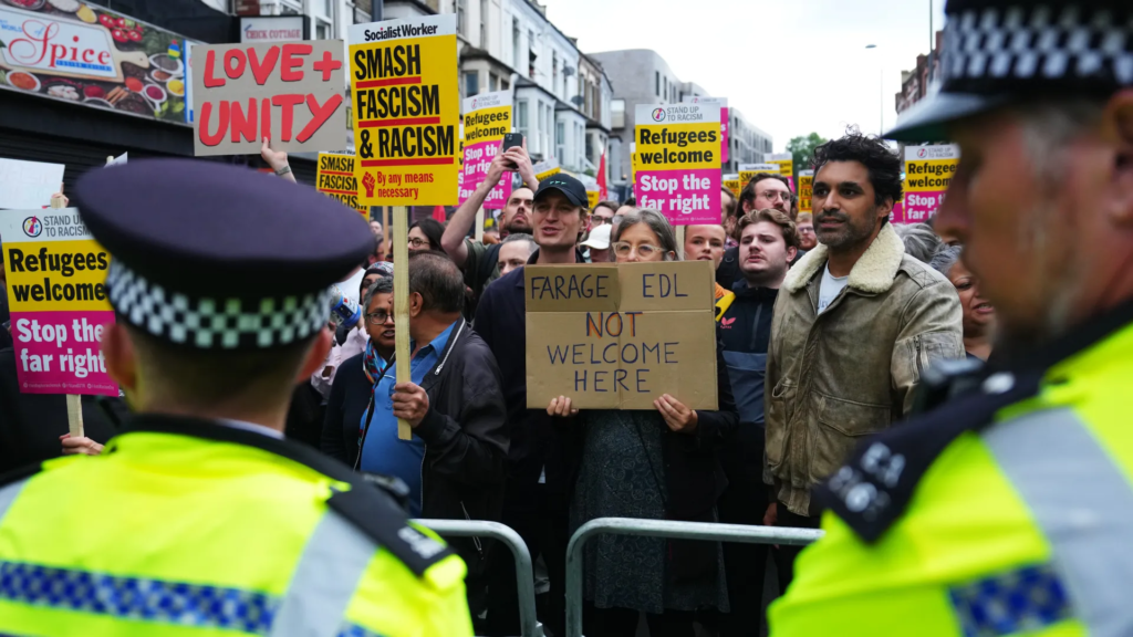 Community leaders and police working together to address and manage the UK Riots of 2024.