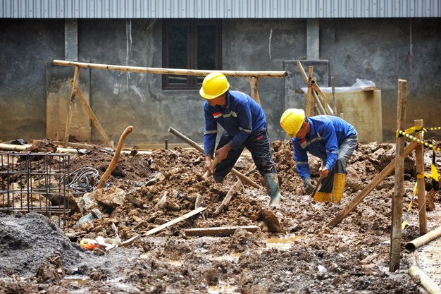 Rescue workers assist a survivor in the aftermath of the Mindanao earthquake, August 2024